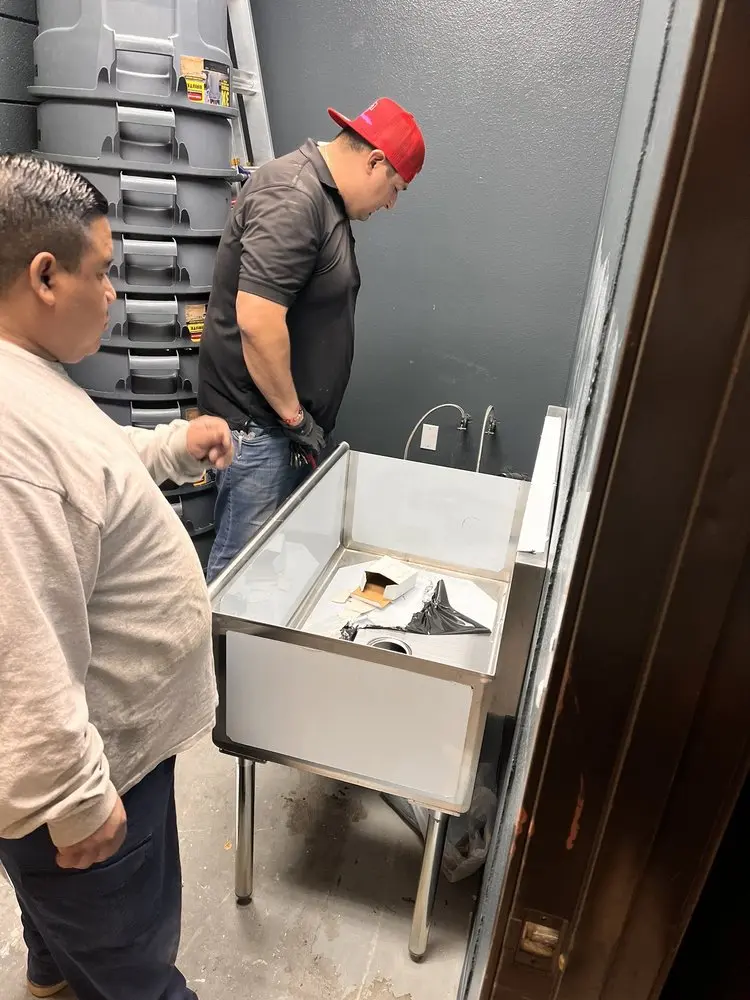 Commercial plumbing and sink installation in Daniels